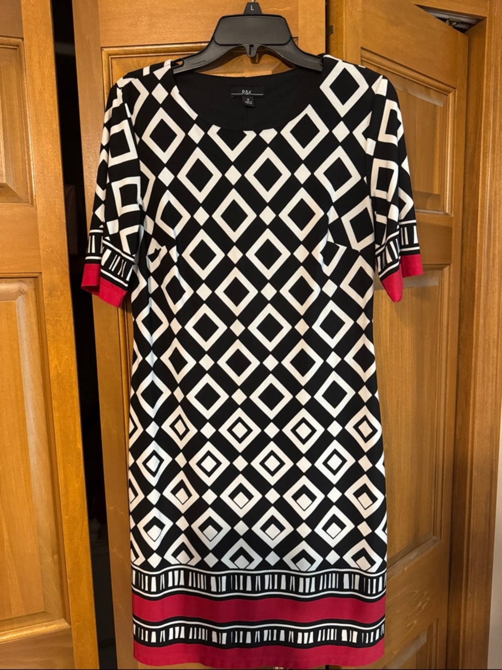 R&K Classic Black Dress with White Logo Detail